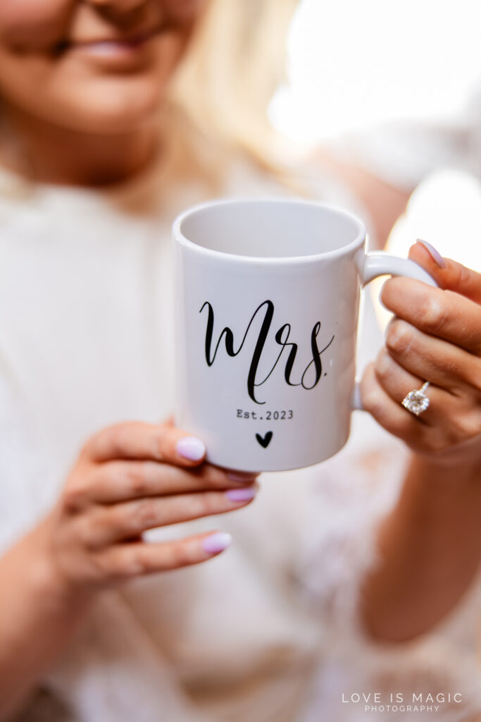bride holding coffee cup