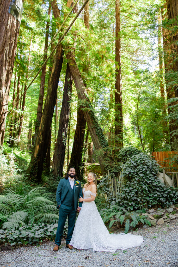 bride and groom kiss in the forest of Big Sur