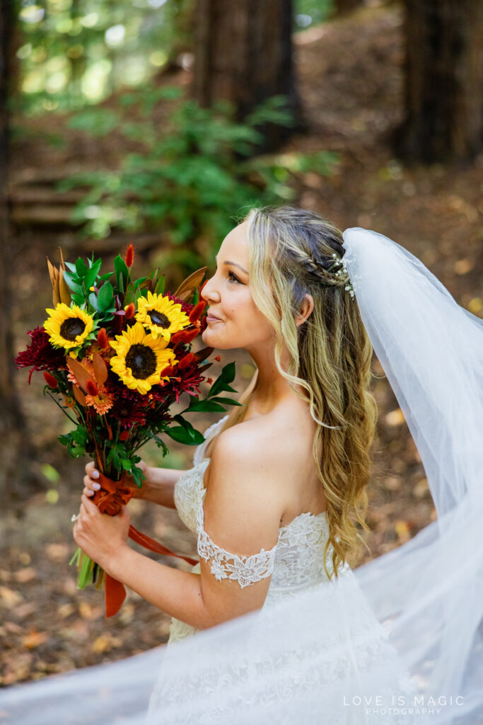 bride smells flowers