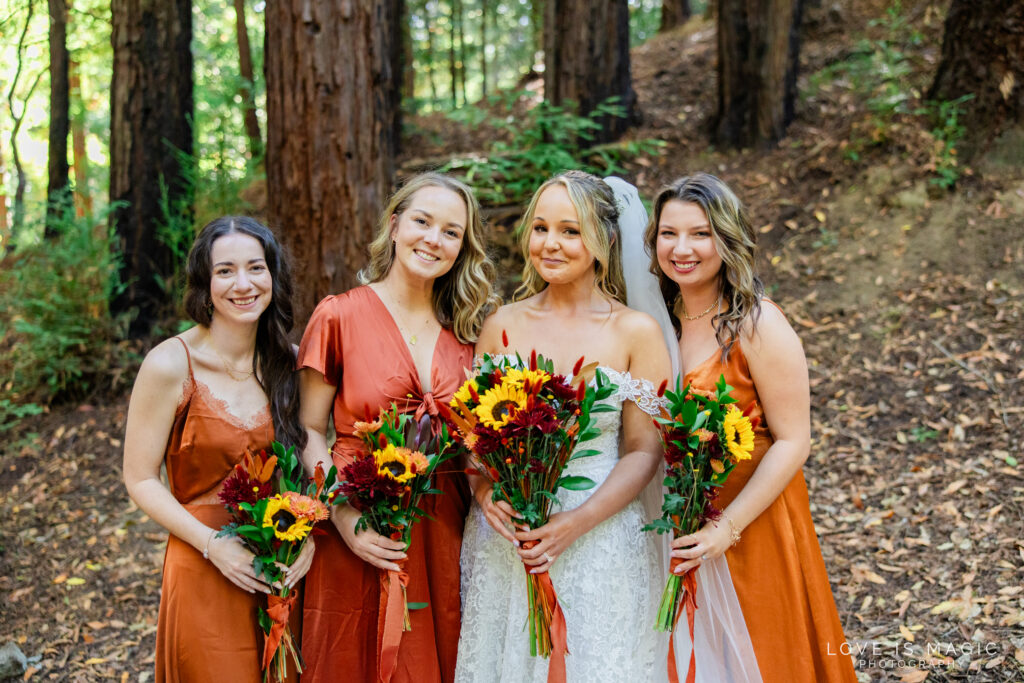 bridesmaids smile with bride