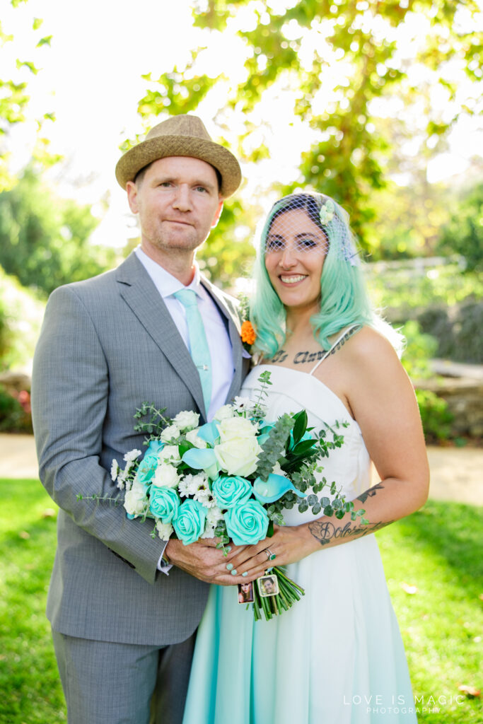 bride and groom smile at their Dundee wedding ceremony