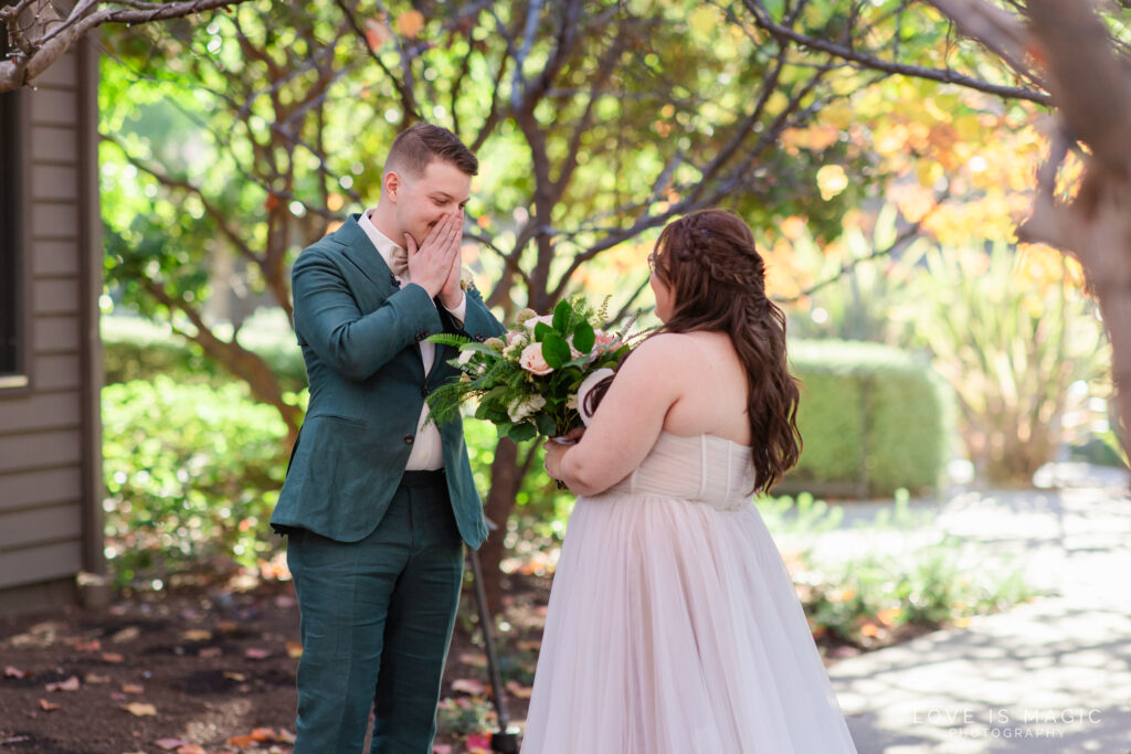 groom excited at first look, photo by Love is Magic Photography