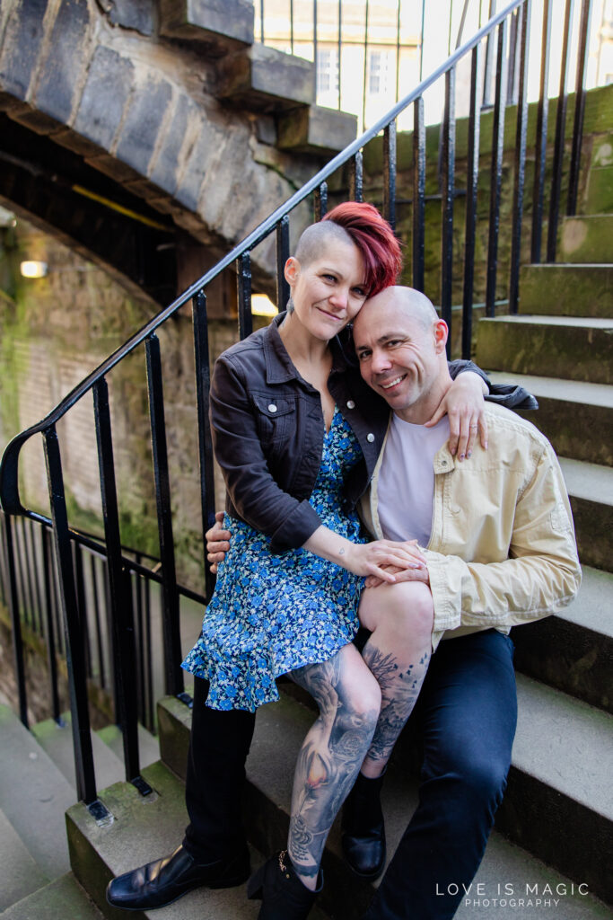 Edinburgh engaged couple smiles in Stockbridge