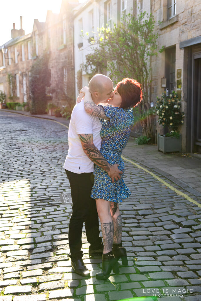 engaged couple kiss on Circus Lane