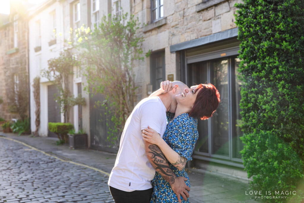 couple laugh in Circus Lane Engagement photos