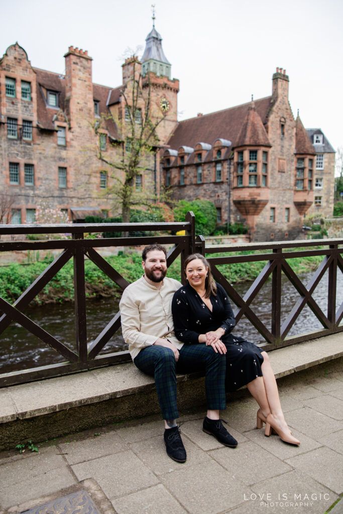 Edinburgh Engagement couple smile in Dean Village