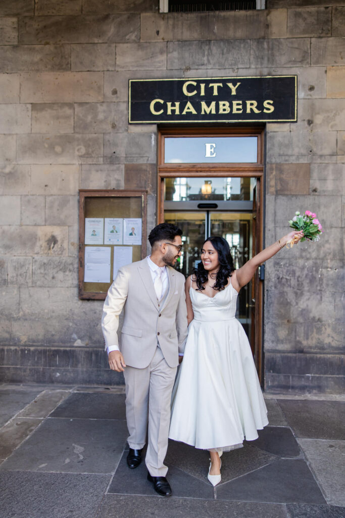 couple exiting Edinburgh City Chambers couple exiting Edinburgh City Chambers
