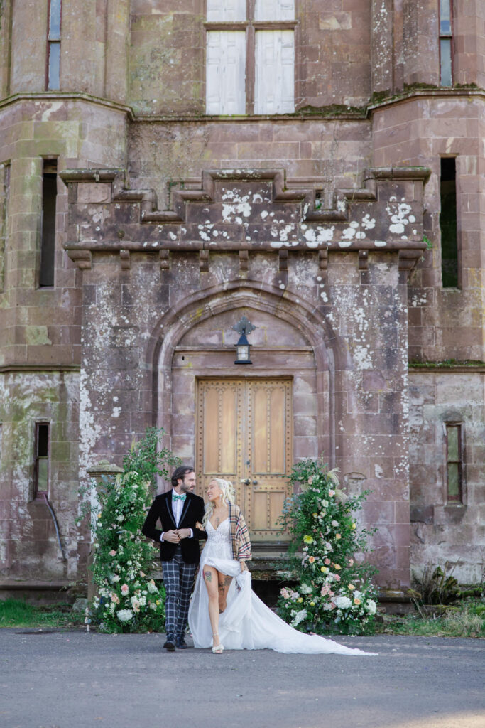 Documentary wedding photography in Glasgow capturing a joyful couple laughing together on their wedding day