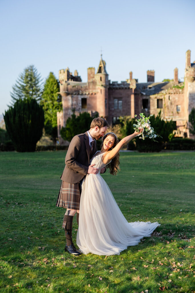 Glasgow wedding photographer capturing candid, colourful moments between newlyweds