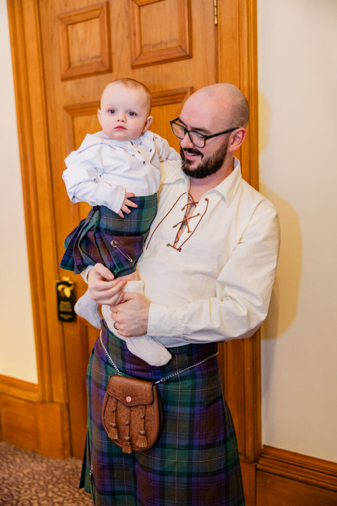 Falkirk wedding photographer guiding a couple into natural, fun poses