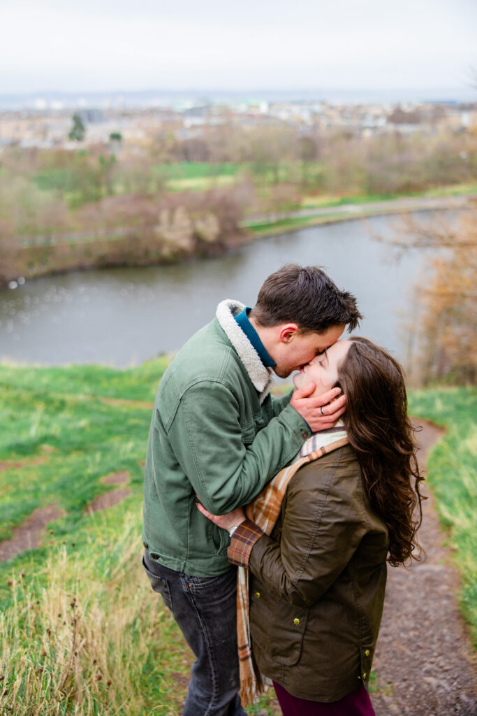 kissing with loch in the background