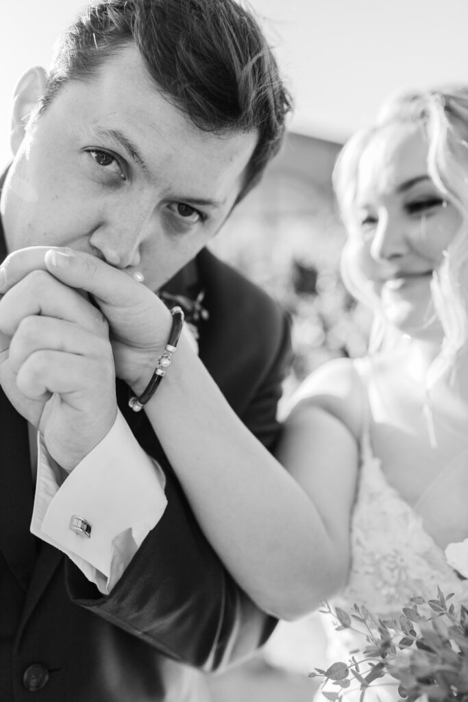 Relaxed wedding couple embracing outdoors in the Scottish countryside