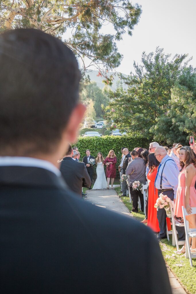 groom seeing bride on aisle for the first time